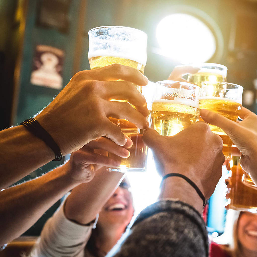 DIR-friends-drinking-and-toasting-at-brewery-bar-restaurant